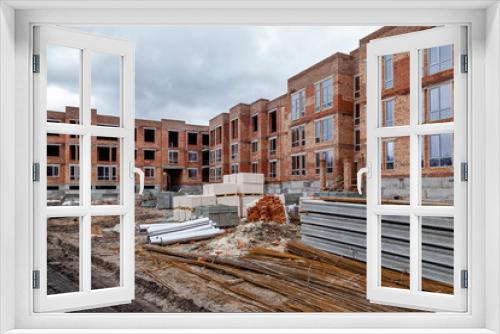 Fototapeta Naklejka Na Ścianę Okno 3D - construction site of a brick house