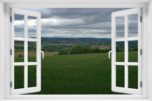 Fototapeta Naklejka Na Ścianę Okno 3D - View from the hill on tranquil landscape in rural Normandy