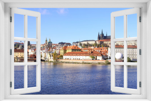 Fototapeta Naklejka Na Ścianę Okno 3D - View on the autumn Prague gothic Castle above River Vltava