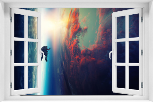 Fototapeta Naklejka Na Ścianę Okno 3D - Spaceman and planet, human in space concept