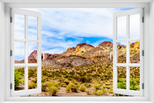 Fototapeta Naklejka Na Ścianę Okno 3D - Colorful and Rugged Mountains along highway SR 165 in El Dorado Canyon on the border of Nevada and Arizona. The canyon is part of the Lake Mead National Recreation Area in the USA