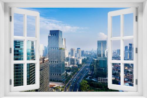 Fototapeta Naklejka Na Ścianę Okno 3D - Beautiful high buildings under blue sky