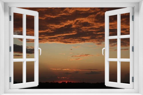 Fototapeta Naklejka Na Ścianę Okno 3D - dark orange background color - cloudy sky structure at sunset