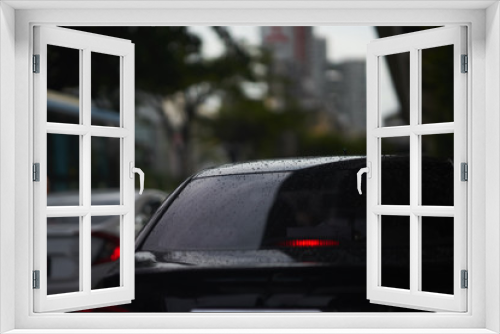 Fototapeta Naklejka Na Ścianę Okno 3D - Rain drops on rear car mirror shield