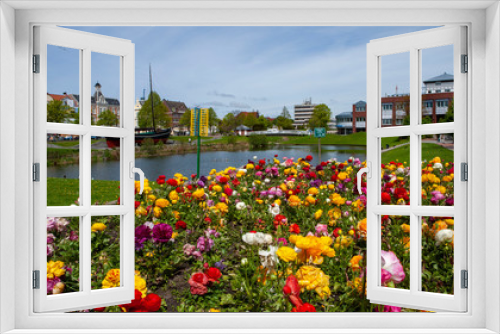 Fototapeta Naklejka Na Ścianę Okno 3D - Cuxhaven Germany. East Frisia Germany. Ost friesland. City view with flowersbeds. Summer.