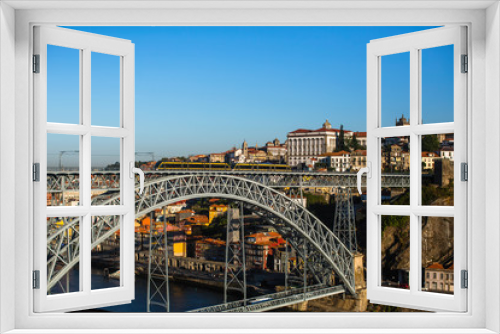 Fototapeta Naklejka Na Ścianę Okno 3D - View of the Bridge Dom Luis I and Douro river in Porto, Portugal.