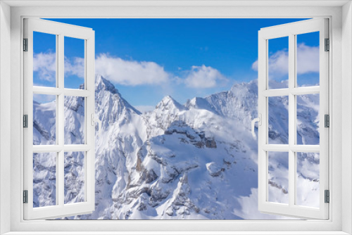 Fototapeta Naklejka Na Ścianę Okno 3D - Stunning panoramic view of the Swiss Alps from the top of the Schilthorn mountain in the Jungfrau region of the country