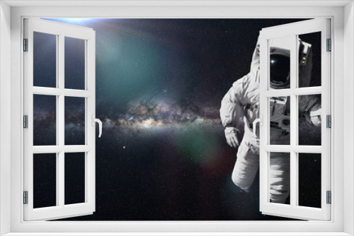 Fototapeta Naklejka Na Ścianę Okno 3D - astronaut in outer space (3d illustration, elements of this image are furnished by NASA)