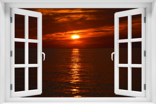 Fototapeta Naklejka Na Ścianę Okno 3D - Un tramonto color fuoco