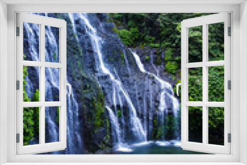 Fototapeta Naklejka Na Ścianę Okno 3D - Banyumala waterfall with cascades among the green tropical trees and plants in the North of the island of Bali, Indonesia