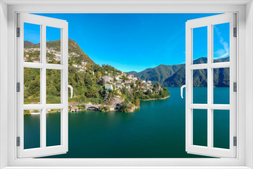 Fototapeta Naklejka Na Ścianę Okno 3D - Panorama aerial view of the lake Lugano, mountains and city Lugano, Ticino canton, Switzerland. Scenic beautiful Swiss town with luxury villas. Famous tourist destination in South Europe