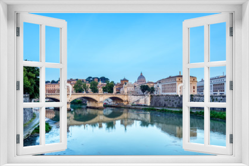 Fototapeta Naklejka Na Ścianę Okno 3D - Emanuele II bridge and St. Peter's Basilica at dawn.