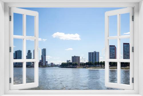 Fototapeta Naklejka Na Ścianę Okno 3D - Cityscape and Erasmus bridge, sunny day. Rotterdam, Netherlands.