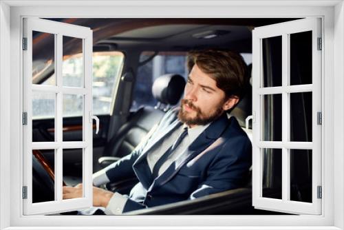 young man in a car