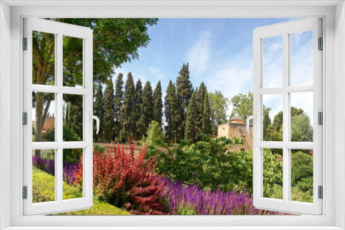 Fototapeta Naklejka Na Ścianę Okno 3D - Granada - The Gardens of Alhambra palace.  May 24, 2019   GRANADA, SPAIN  