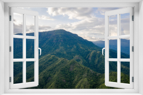 Fototapeta Naklejka Na Ścianę Okno 3D - Aerial view of mountains and chewed roads on the mountain during sunset at Khao Kho Viewpoint, Phetchabun Province, Thailand