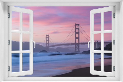 Fototapeta Naklejka Na Ścianę Okno 3D - Classic panoramic view of famous Golden Gate Bridge seen from scenic Baker Beach in beautiful golden evening light on a dusk with blue sky and clouds in summer, San Francisco, California, USA