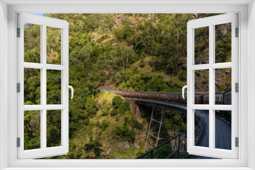 Fototapeta Naklejka Na Ścianę Okno 3D - bridge in the mountains on train