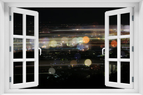 Fototapeta Naklejka Na Ścianę Okno 3D - 夜景が生み出す光の軌跡