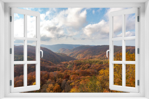Fototapeta Naklejka Na Ścianę Okno 3D - Autumn foliage scenery view, beautiful landscapes. Fall is full of magnificent colours. Entire mountain and valley is bathed in different hues of red, orange and golden colors background