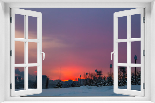 Fototapeta Naklejka Na Ścianę Okno 3D - Ruby red sunset in a residential area of Moscow