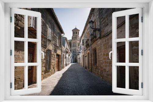 Fototapeta Naklejka Na Ścianę Okno 3D - Medieval street of Baeza with old University Tower - Baeza, Jaen Province, Andalusia, Spain