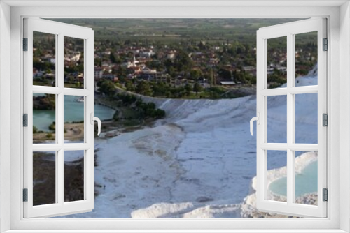 Fototapeta Naklejka Na Ścianę Okno 3D - Turkey, aerial view of the travertine terraces at Pamukkale (Cotton Castle), natural site of sedimentary rock deposited by water from hot springs, famous for carbonate mineral left by flowing water
