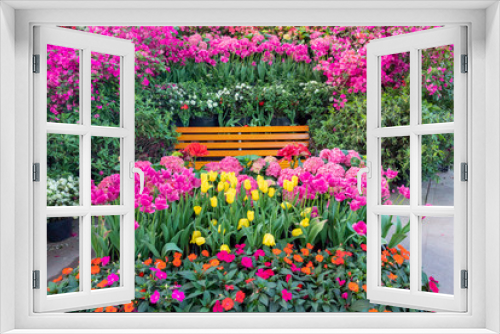Fototapeta Naklejka Na Ścianę Okno 3D - Colorful gardens and lounge chairs in the garden