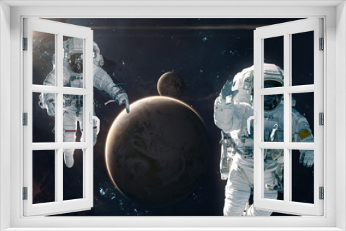 Fototapeta Naklejka Na Ścianę Okno 3D - Two astronauts on background of Earth and Moon. Solar system. Science fiction. Elements of this image furnished by NASA