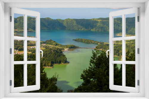 Fototapeta Naklejka Na Ścianę Okno 3D - Lagoa das Sete Cidades is located on the island of São Miguel, Azores and is characterized by the double coloration of its waters, in green and blue.