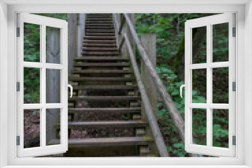 Fototapeta Naklejka Na Ścianę Okno 3D - Wooden stairs in the forest