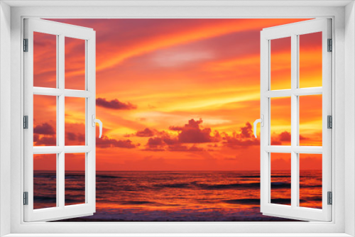 Fototapeta Naklejka Na Ścianę Okno 3D - Dramatic sunset sky over the tropical sea.