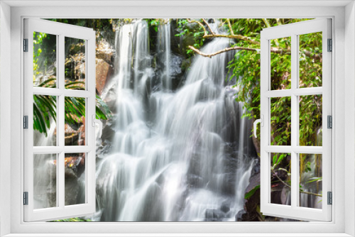 Fototapeta Naklejka Na Ścianę Okno 3D - Beautiful cascading waterfall in a dense jungle gully - nature, landscape and natural environment image.