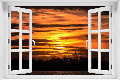 Fototapeta Naklejka Na Ścianę Okno 3D - View of dramatic burning orange cloudy sky during the sunset period. Natural view and scenic photo.