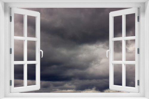 Dark rain clouds before a thunderstorm. Background of storm clouds before a thunder-storm.