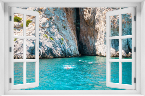 Fototapeta Naklejka Na Ścianę Okno 3D - Seascape view to turquoise waters of Aegean Sea in Island Moni near Athens, blue caves.