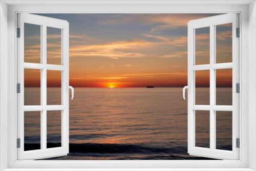 Fototapeta Naklejka Na Ścianę Okno 3D - sunset above ocean while cruising through sea