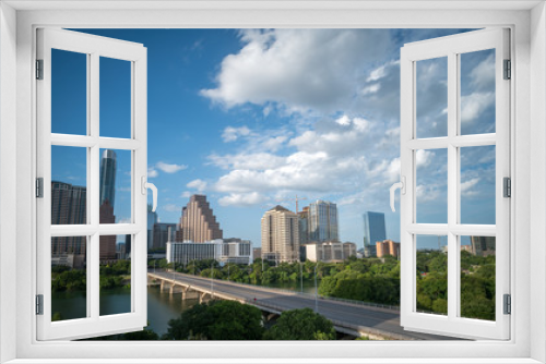 Fototapeta Naklejka Na Ścianę Okno 3D - Day Time View of Downtown Austin Skyscrappers With Clouds Passing By