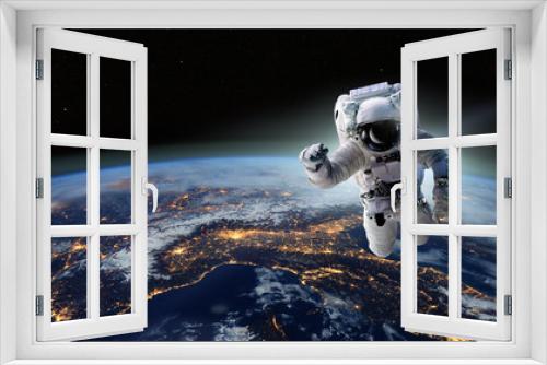 Fototapeta Naklejka Na Ścianę Okno 3D - Concept of conquering the universe by the human race. Elements of this image furnished by NASA