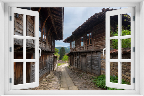 Fototapeta Naklejka Na Ścianę Okno 3D - Revival traditional bulgarian houses of the nineteenth century in historical old town of Kotel, Sliven Region, Bulgaria. Heritage monument of culture in spring time