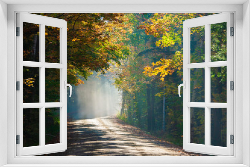 Fototapeta Naklejka Na Ścianę Okno 3D - Road through morning fog and  autumn trees, Stowe Vermont, USA