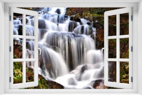 Fototapeta Naklejka Na Ścianę Okno 3D - Winter; Water in movement in a mountain stream