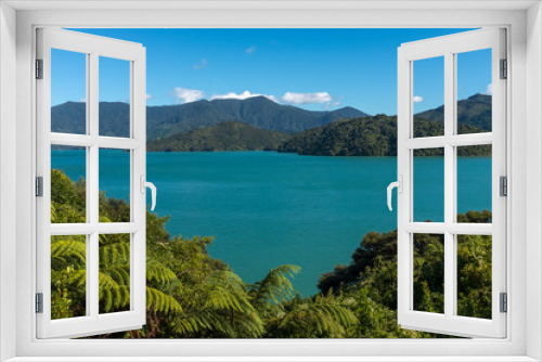 Fototapeta Naklejka Na Ścianę Okno 3D - Looking down the beautiful and stunning Marlborough Sound and the surrounding hills at the top of the South Island, New Zealand on a sunny day.