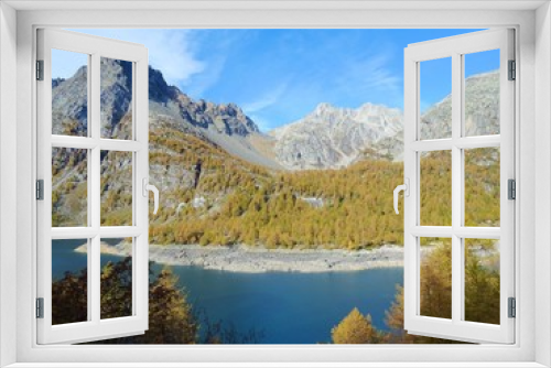 Fototapeta Naklejka Na Ścianę Okno 3D - A classic alpine lake immersed in the Nature of the Natural Park 