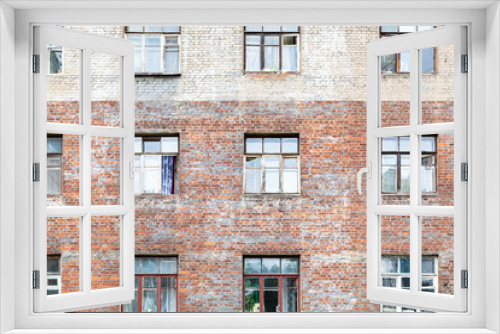Fototapeta Naklejka Na Ścianę Okno 3D - front view of shabby wall of old brick house