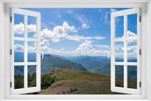 Fototapeta Naklejka Na Ścianę Okno 3D - Horizon peaks and cloudy sky panorama.