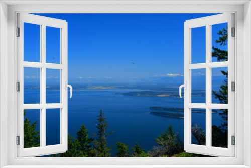 Fototapeta Naklejka Na Ścianę Okno 3D - Panoramic view of the San Juan Islands with Mount Baker in the background as seen from Mount Constitution on Orcas Island, Washington