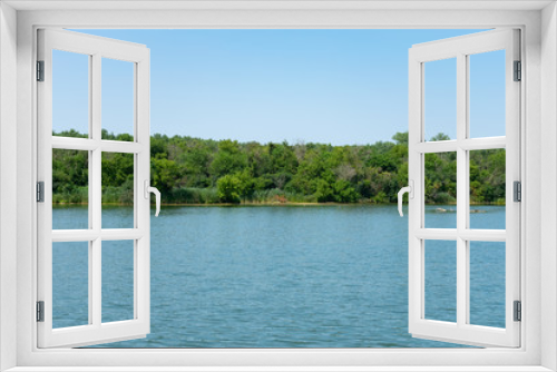 Fototapeta Naklejka Na Ścianę Okno 3D - Water Filled Quarry in Suburban Lemont Illinois