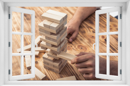 Fototapeta Naklejka Na Ścianę Okno 3D - man hand wooden cubes