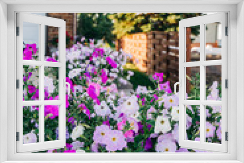 Fototapeta Naklejka Na Ścianę Okno 3D - home house curb appeal Flower beds garden Blooming in the Spring Summer at a home 